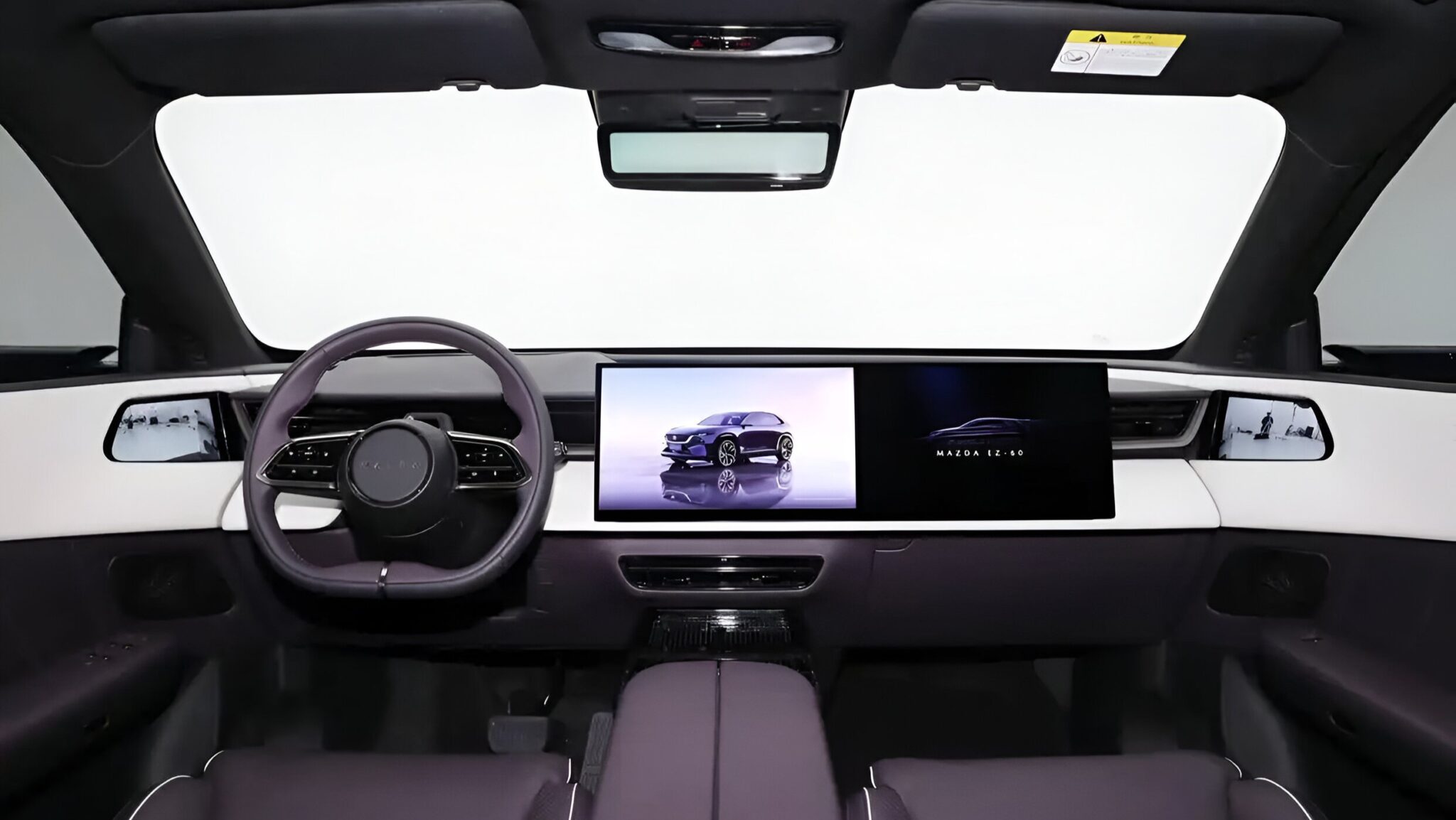 Анонс тест-драйва Mazda показала интерьер нового кроссовера EZ-60 