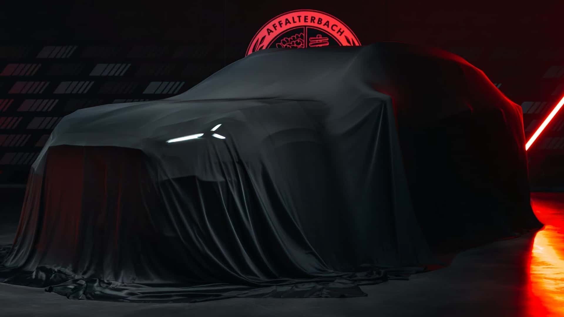 Анонс тест-драйва Mercedes-AMG показал тизер своего нового флагманского электрического кроссовера