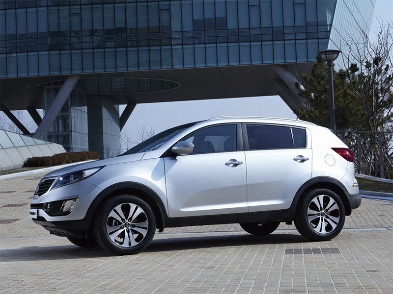 Kia Sportage 2014 вид сбоку фото 2